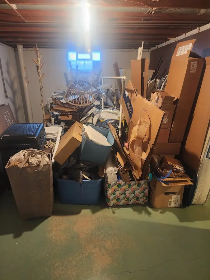 Roll-off dumpster container at job site for 4 Yard Dumpster Rental in Plum